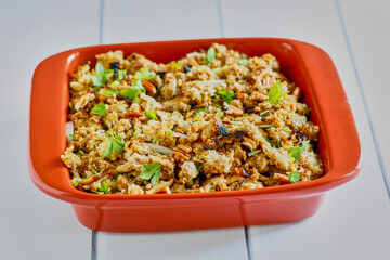 Thanksgiving stuffing with croutons, fresh herbs, and mixed nuts