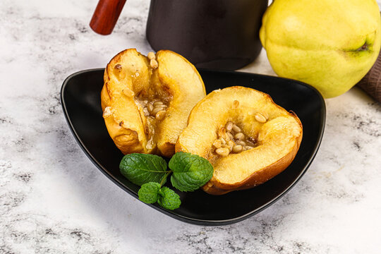 Baked quince with honey and cedar