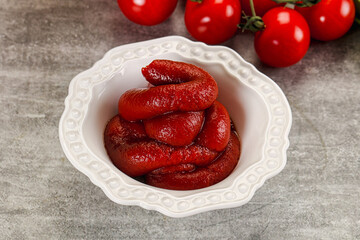Red tomato paste in the bowl