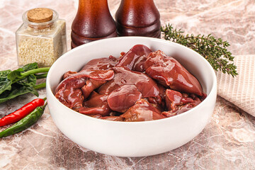 Raw uncokked chicken liver in the bowl