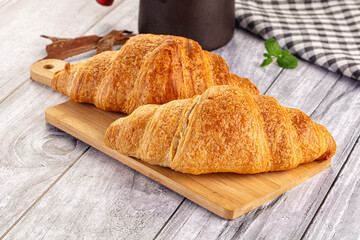 Fresh hot homemade croissant for breakfast