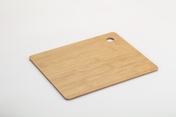 Wooden cutting board isolated on white background