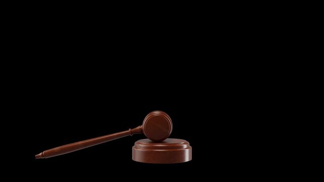 A judge's gavel suspended in mid-air on a black backdrop showcasing 3d render quality for video or animation use