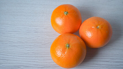 Fresh oranges isolated on white background