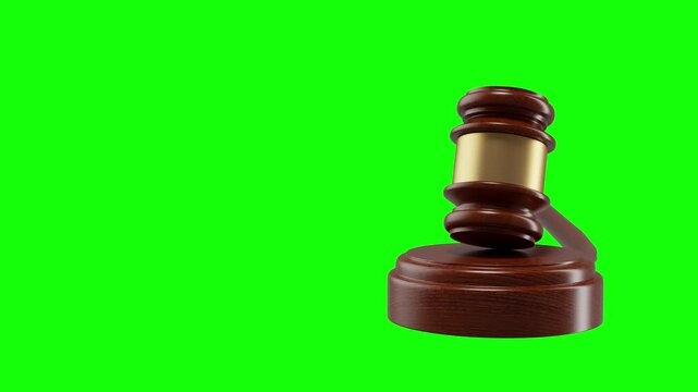 Wooden gavel set for keying, with a vibrant green screen ideal for animation or video composites