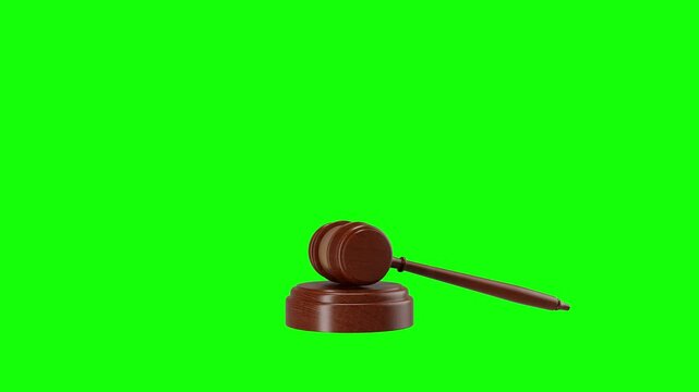 A wooden gavel prominently placed on a green screen, ideal for keying and animation in legal-oriented content