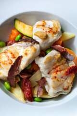 Unusual plate of meat and fish