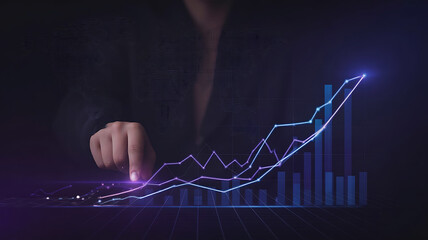 Businessman interacting with a glowing blue financial growth chart and digital data overlay