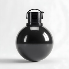 Obraz premium A black spherical object with a metal top sits on a white background