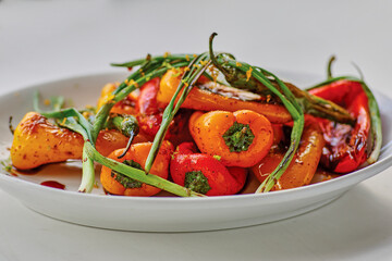 roasted sweet peppers with charred green onions