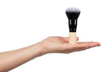 Hand holding a makeup brush isolated on transparent background