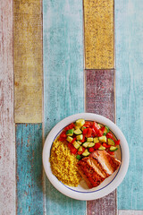 dijon glazed salmon fillet with yellow rice and sautéed vegetables, for layout