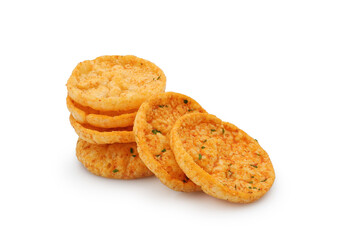 Spicy rice chips with paprika and basil isolated on white background	