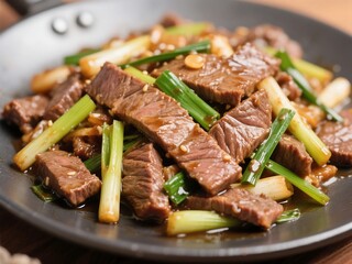 a sizzling plate of stir-fried beef and scallions—juicy slices of steak, tender yet crisp, coated in a savory sauce