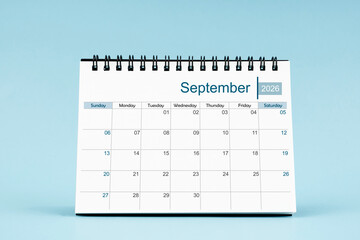 September 2026 Monthly desk calendar for 2026 year on soft blue color background.