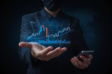 A businessman uses his hands to draw a digital graph on a transparent screen, visualizing a global business concept