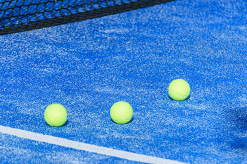 Three Padel Balls Court Net Shadow