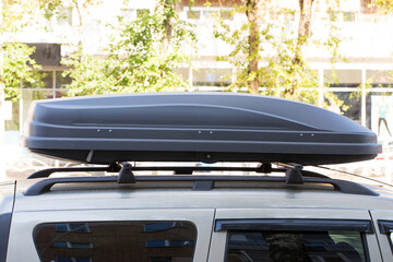 Roof rack for a passenger car. Carriage of cargo by car.