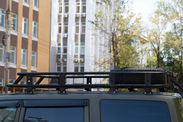 Roof rack for a passenger car. Carriage of cargo by car.