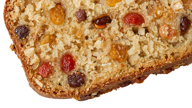 Closeup of freshly baked fruitcake slice with colorful raisins, crumbly texture and golden crust isolatedon the transparent background