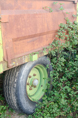 A vintage agricultural trailer left to decay in the wild. A Vintage Agricultural Trailer