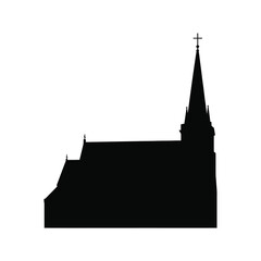 Fototapeta premium Silhouette of a gothic church with a tall steeple and cross