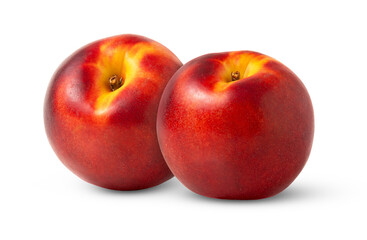 Two ripe organic nectarine peaches isolated. Juicy nectarine peach with clipping path.