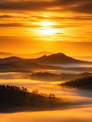 Fototapeta premium Serene sunrise over rolling hills shrouded in mist, creating a tranquil landscape at dawn