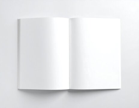 Top-down view of an open blank white book or magazine with empty pages, offering clean copy space for text or design, against a simple white background for a minimalist mockup.