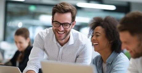 A group of cheerful colleagues enjoying collaboration and sharing ideas during a lively meeting in a modern workspace