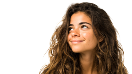 Young Latina Woman Looking Up Smiling With Freckles and Wavy Hair