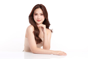 A beautiful young Asian woman with clean, fresh skin against a white background. Skincare, facial...