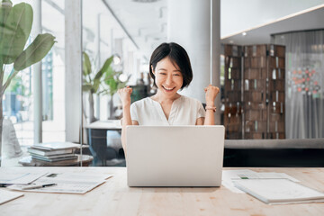 Mature business woman showing happiness getting bonus reward or good news on screen laptop pc...