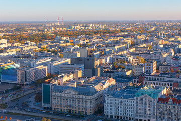 Aerial view of Warsaw downtown cityscape on morning . The sprawling urban landscape features a mix...