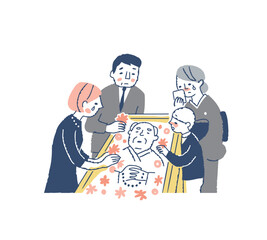 納棺・棺に花を手向ける親族