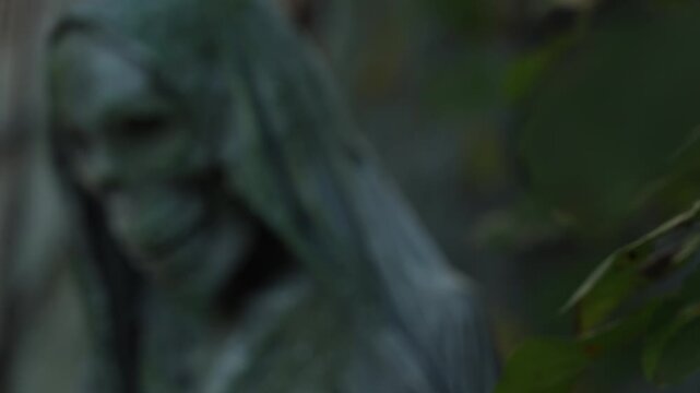 Grim reaper or Sensenmann, human figure with skull covered in cloth depicting death. End of humanity, war, conflict and pandemic concept. Unsettling eerie atmosphere ominous setting.