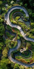 Aerial view of a winding garden with stone pathways and tiered plantings