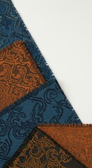 Textured fabric swatches displaying intricate, repeating patterns
