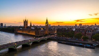 Fototapeta premium Panoramic view of the Houses of Parliament at sunset over the River Thames.