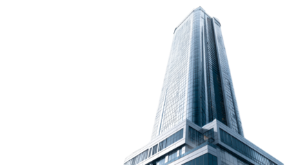 Modern glass skyscraper with sharp angles against a clear sky