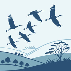Flock of birds flying in a V formation across a clear sky, symbolizing migration and unity in nature