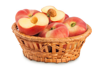 chinese flat donut peaches in a wicker basket isolated on white background