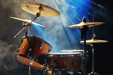 Drum set illuminated by dramatic lighting creates an energetic ambiance in the music venue