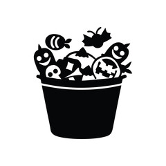 Black silhouette of a halloween bucket filled with spooky treats and characters isolated on white background isolated on transparent background