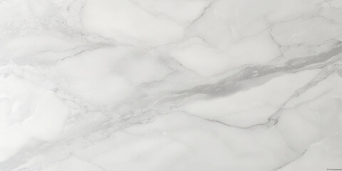 Luxury texture of light gray marble with flowing natural patterns and faint metallic highlights.	