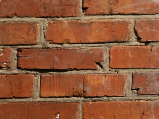 Detailed Close-up of an Old Red Brick Wall