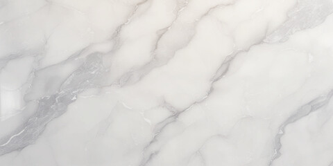 Luxury texture of light gray marble with flowing natural patterns and faint metallic highlights.	