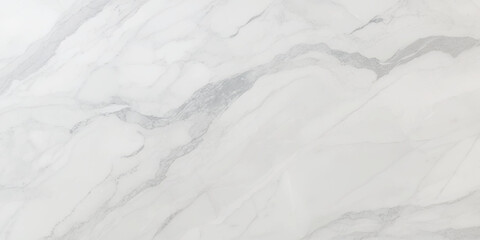 Luxury texture of light gray marble with flowing natural patterns and faint metallic highlights.