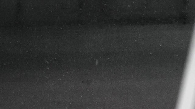 heavy rain outside falling on asphalt forming puddles.
Wet road during rain and heavy pouring rain.
Storm warning and cyclone
