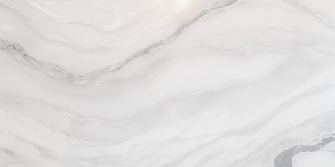 Luxury texture of light gray marble with flowing natural patterns and faint metallic highlights.